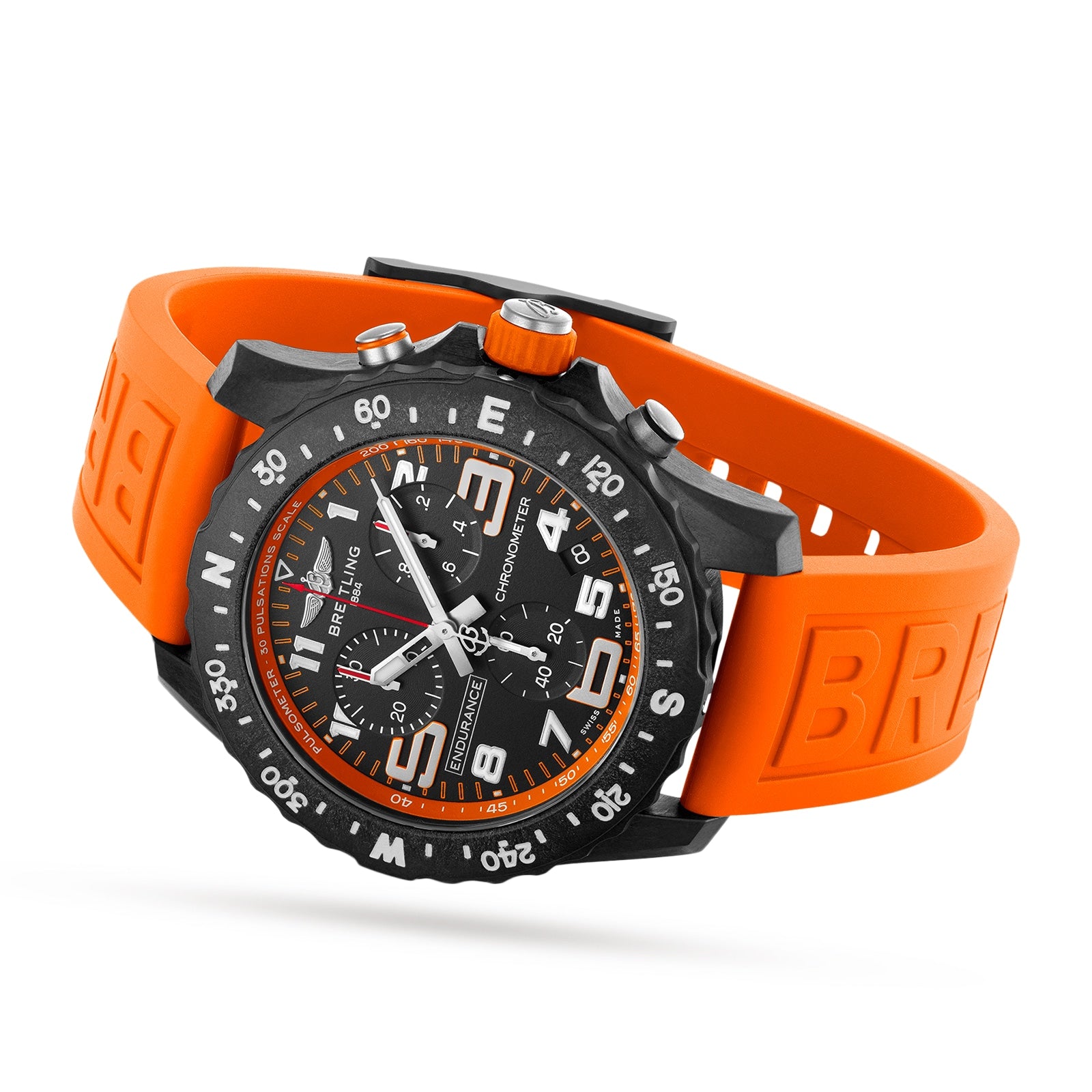 The Breitling Endurance Pro 44 is an athleisure watch featuring a black dial, durable Breitlight® case, white numerals, orange accents, and an orange rubber strap, displayed on a white background.