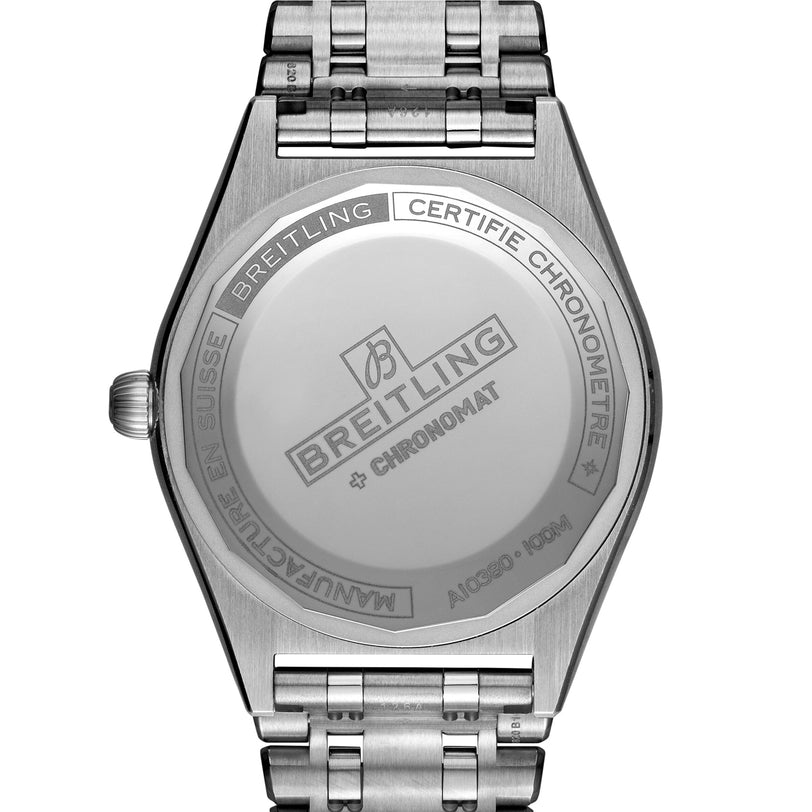 The back of a Breitling Chronomat Automatic 36 wristwatch displays engraved brand markings, COSC certified details, and information about the Chronomat Automatic 36 on the stainless steel case back.