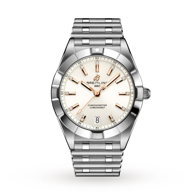 The Breitling Chronomat 32 features a stainless steel case, silver Rouleaux bracelet, white dial with gold-tone markers and hands, date at 6 o’clock, Chronometer text on the face, and runs on the acclaimed Breitling 77 calibre.