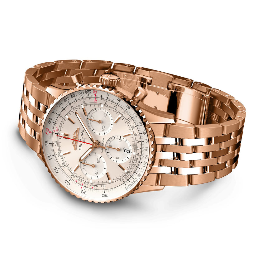 The Breitling Navitimer B01 Chronograph 41 in rose gold features a white dial with three subdials, a multi-link bracelet, and the renowned Breitling 01 calibre, shown at an angle.