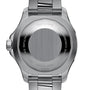 Close-up of the Breitling Superocean Automatic 44s stainless steel case back, showing engraved markings, serial number, and metal bracelet.