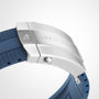 Close-up of the BREITLING-engraved clasp on a Superocean Automatic 44, attached to a textured blue strap.