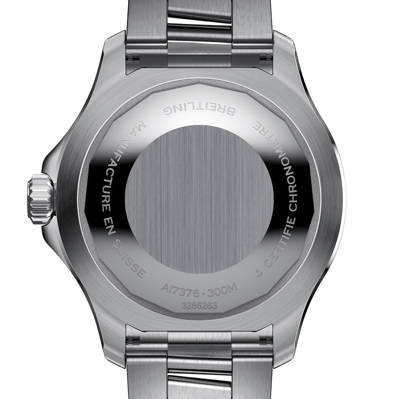 The back of the Breitling Superocean Automatic 44 displays a stainless steel case engraved with its model number, water resistance, and certification details.