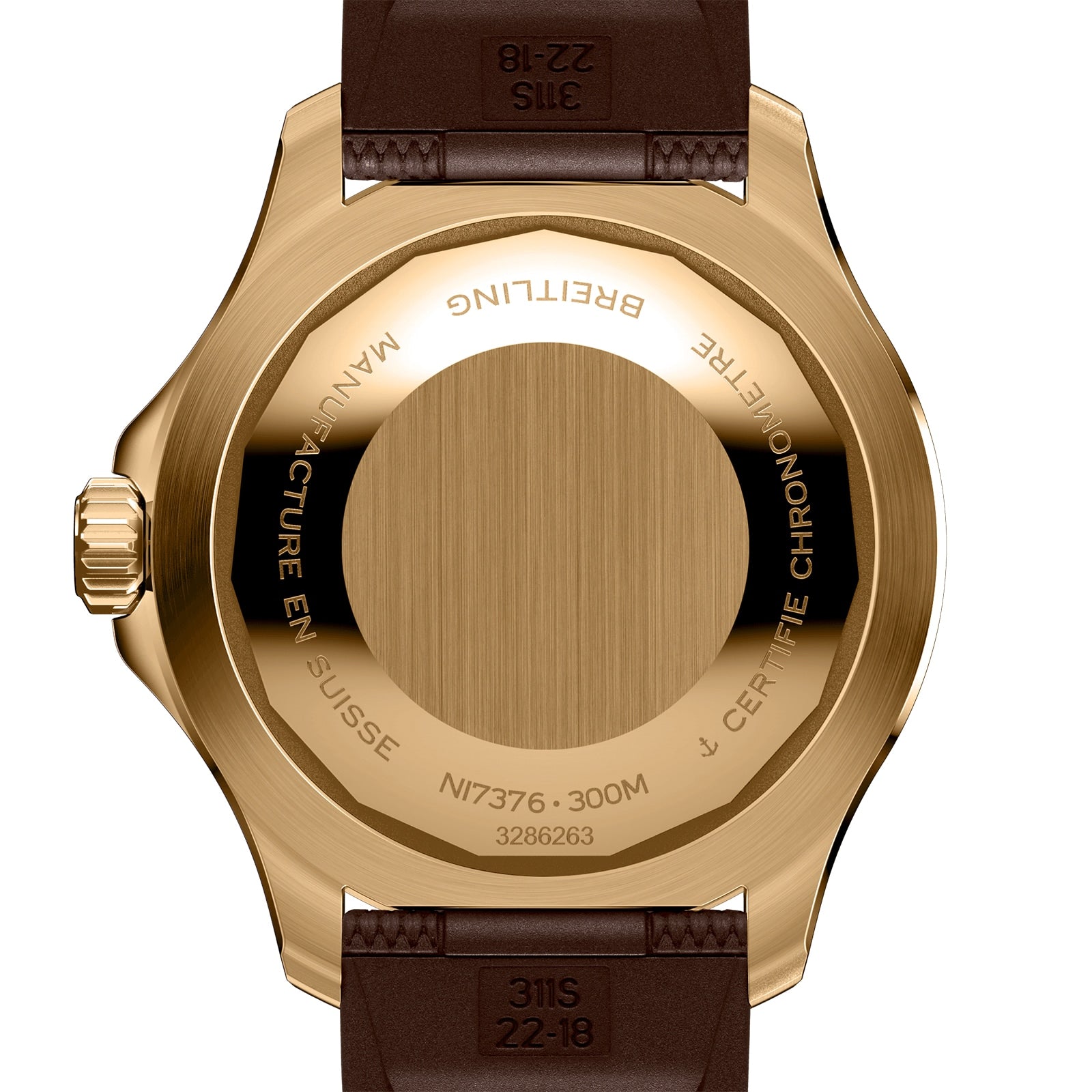 Close-up of the back of a gold Breitling Superocean Automatic 44 with engraved text, brown leather strap, and visible model and serial numbers, known for its water-resistant design.