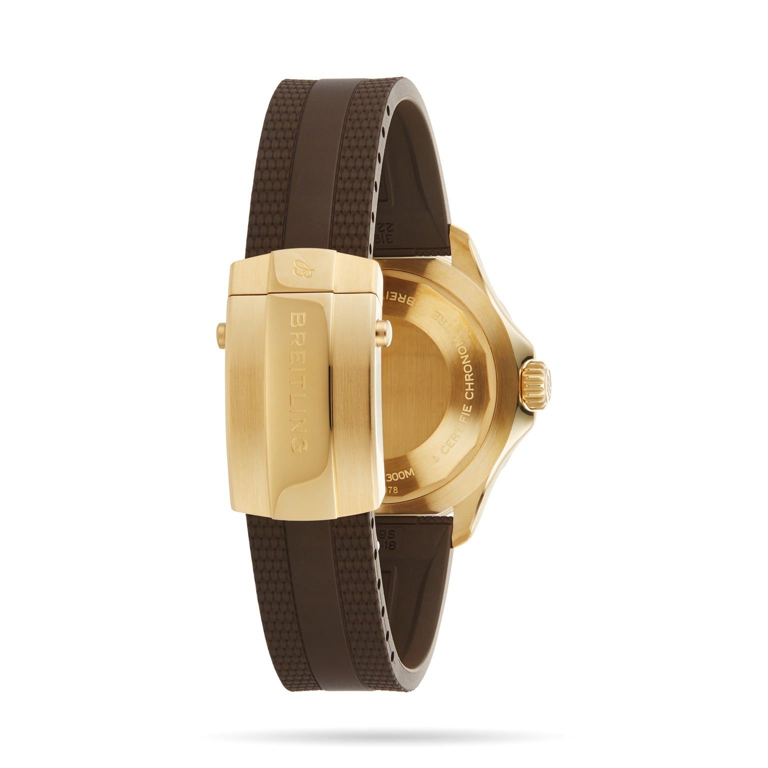 A gold Breitling Superocean Automatic 44 wristwatch, shown from the back, features a brown textured rubber strap and a gold clasp engraved with the Breitling logo.