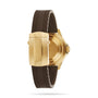 A gold Breitling Superocean Automatic 44 wristwatch, shown from the back, features a brown textured rubber strap and a gold clasp engraved with the Breitling logo.