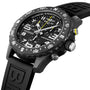 A close-up of the Breitling Endurance Pro 44 watch highlights its black face, white markers, black rubber strap, and rotating bezel with numeric engravings—all crafted in ultra-lightweight Breitlight®.