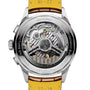The back view of the Breitling Premier B01 Chronograph 42 reveals its exposed mechanical movement, engraved detailing, and yellow leather strap—showcasing COSC-certified chronograph precision.