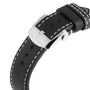 Close-up of a black leather strap with white stitching and a silver buckle bearing the Breitling logo, made for the Classic AVI Chronograph 42 Tribute To Vought F4U pilots watch.