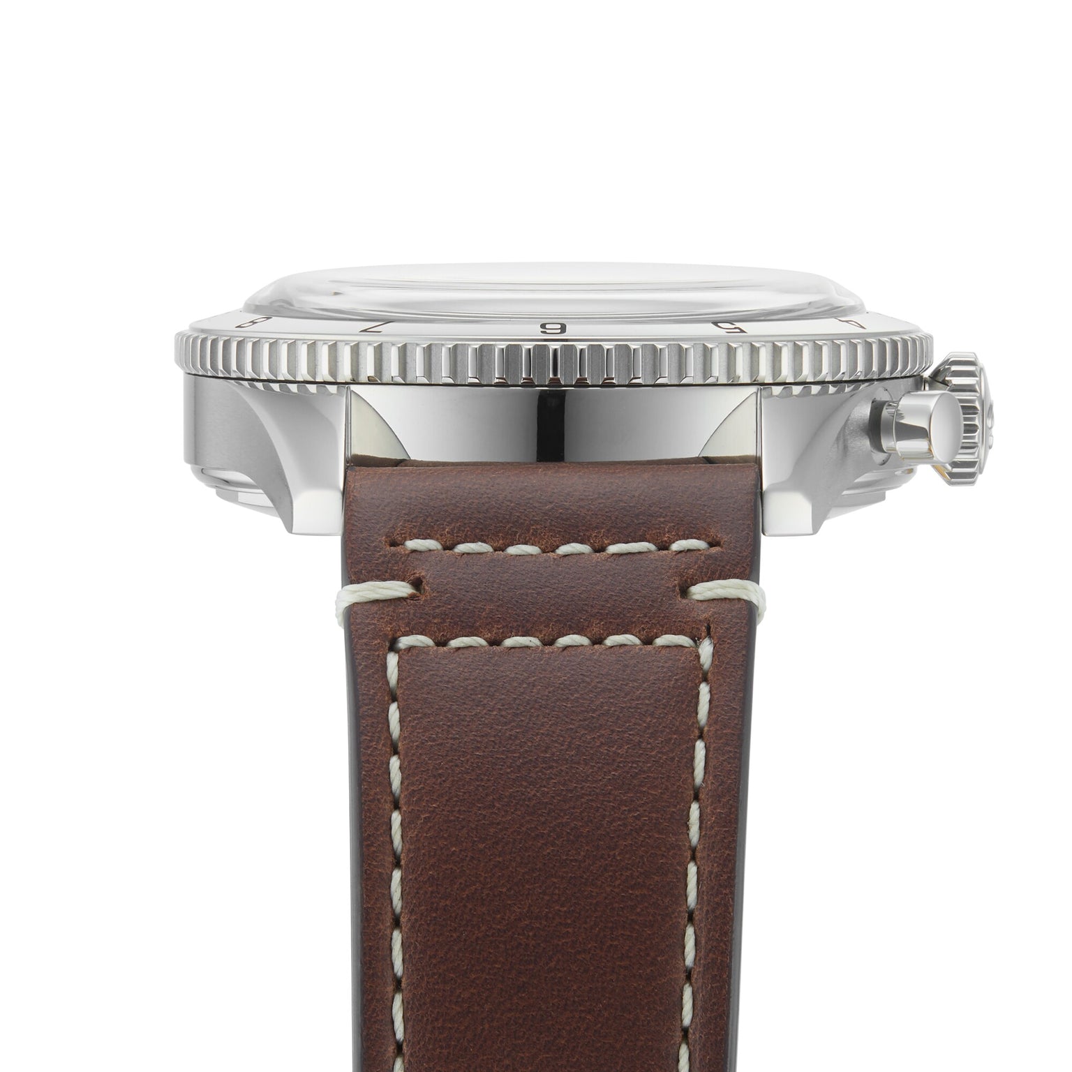 Side view of the Breitling Classic AVI Chronograph 42 Curtiss Warhawk featuring a silver case, notched bezel, and brown leather strap with white stitching.