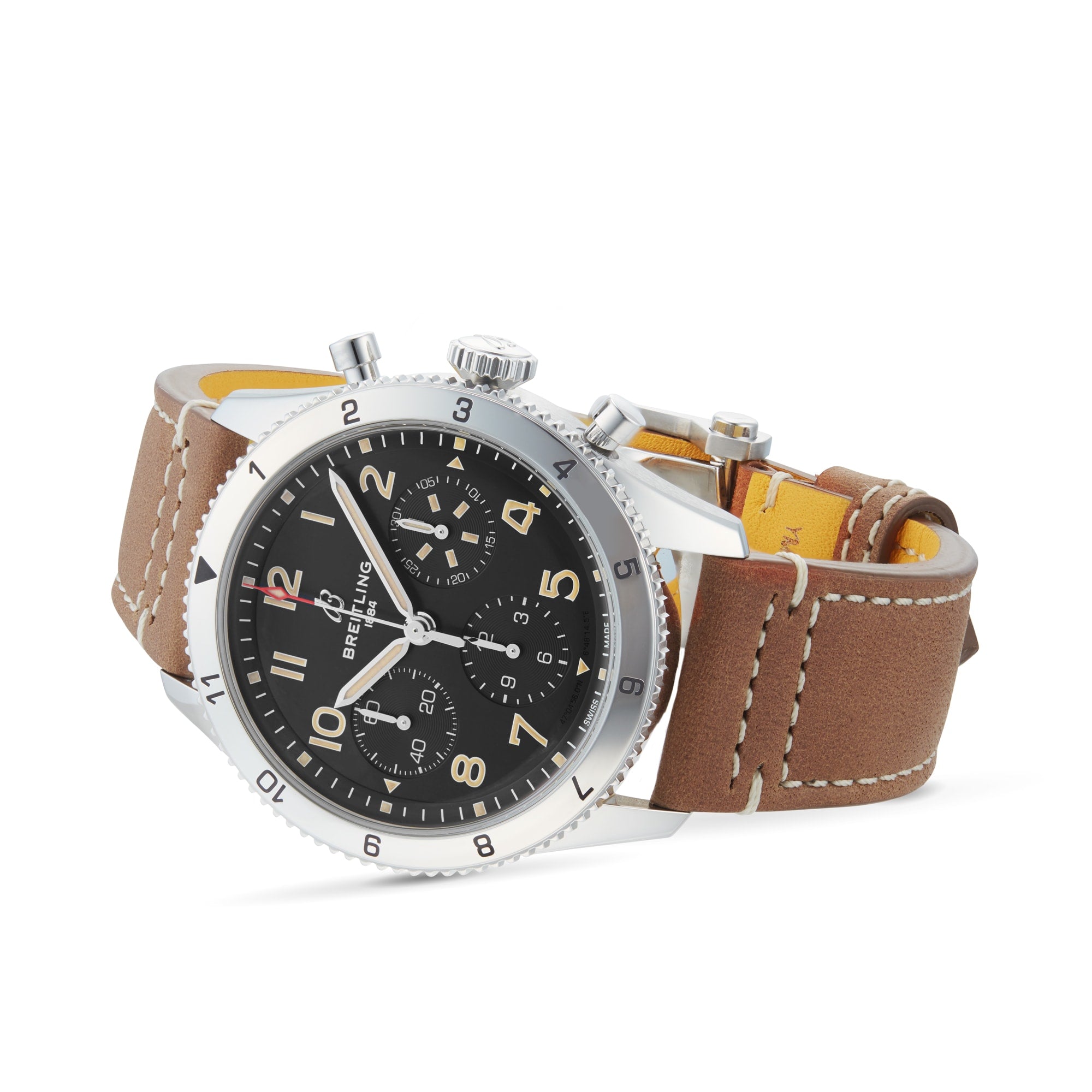 The Breitling Classic AVI Chronograph 42 P-51 Mustang features a stainless steel case, black dial with three subdials powered by Breitling 23 calibre, and a brown leather strap with white stitching, shown on a white background.