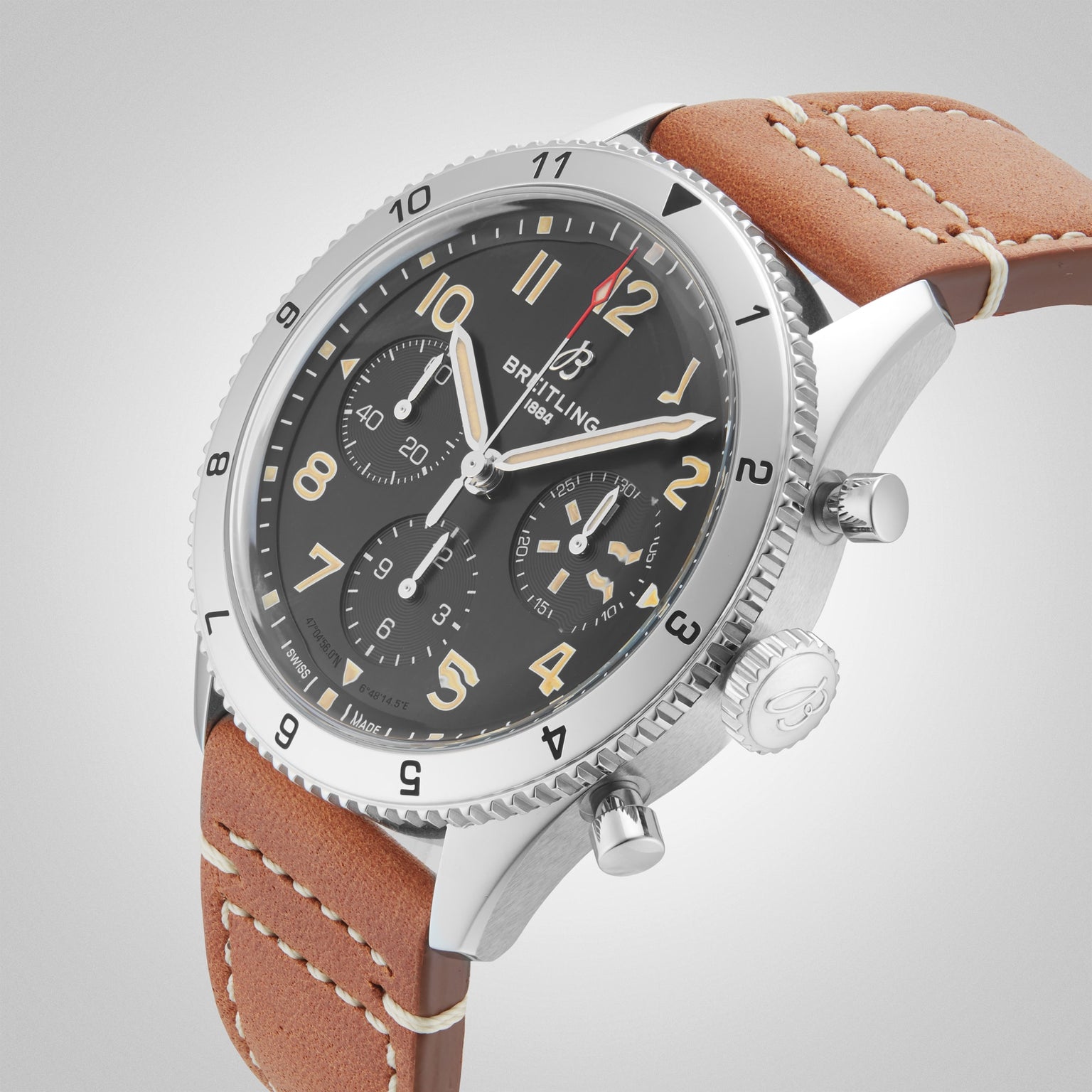 Breitling Classic AVI Chronograph 42 P-51 Mustang stainless steel watch with brown leather strap, black dial, three subdials, Arabic numerals, and reliable Breitling 23 calibre—a true pilots timepiece.