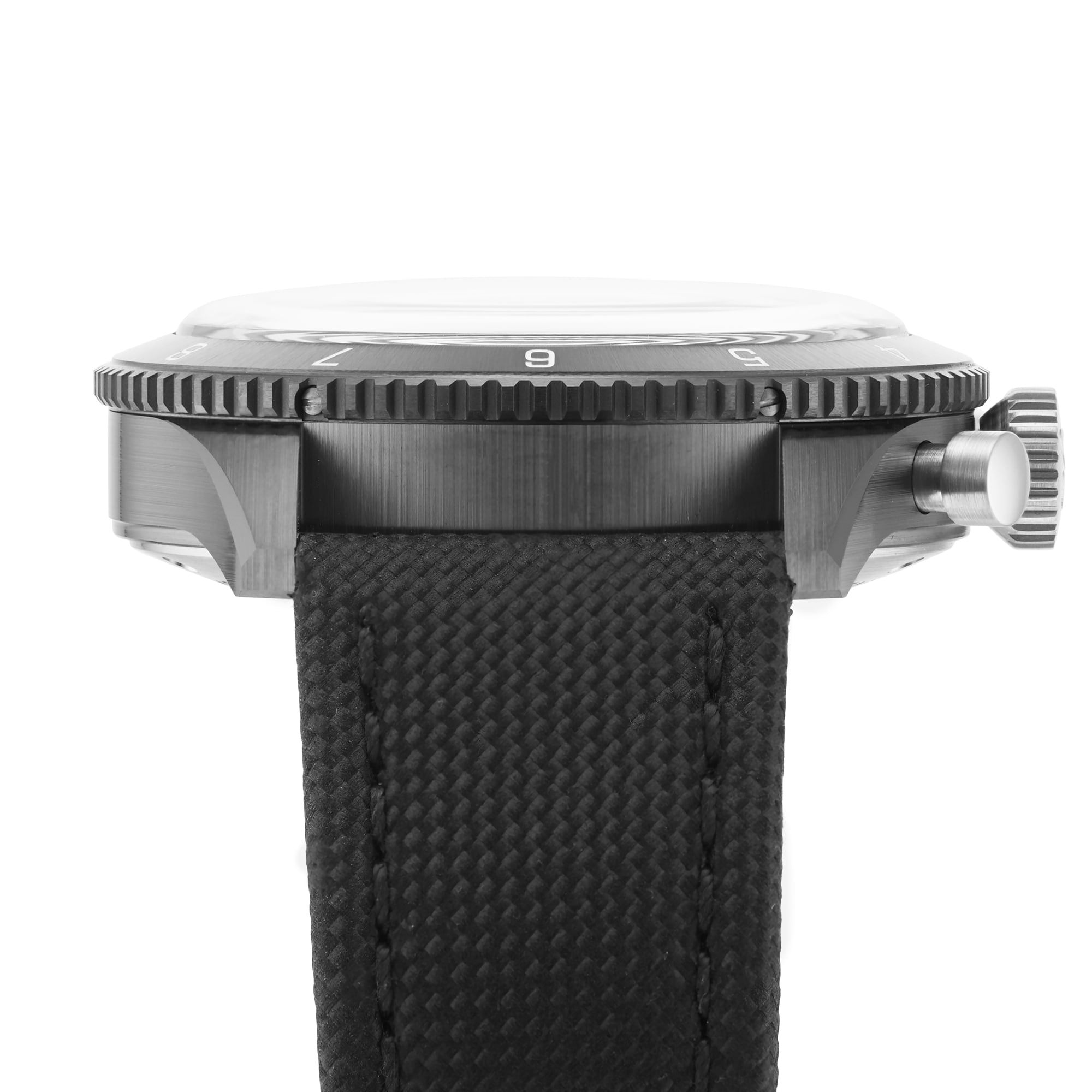 Side view of the Breitling Super AVI B04 Chronograph GMT Mosquito Night, featuring a black textured strap, metal case, ridged bezel, and prominent crown—its design pays tribute to aviation history and the legendary de Havilland Mosquito.