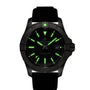 The Breitling Avenger Automatic 42 is a black wristwatch featuring glowing green hour markers and hands, paired with a black strap.