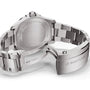 A close-up of the back of a stainless steel Breitling Avenger Automatic 42 with an open clasp, displaying its engraved case and bracelet, featuring the precise Breitling 17 calibre movement.