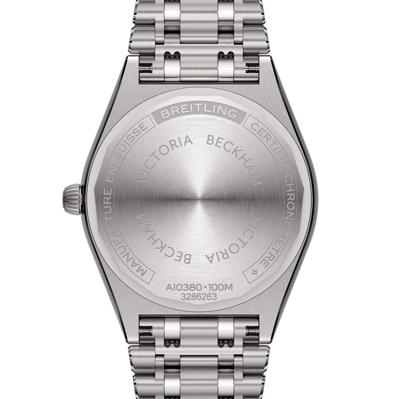 Close-up of the back of the Breitling Chronomat Automatic 36 Victoria Beckham, engraved with VICTORIA BECKHAM and highlighting exclusive details of their collaboration on a sleek metal bracelet.