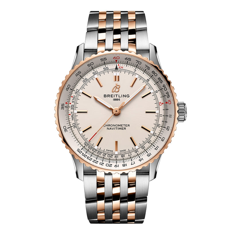 The Breitling Navitimer Automatic 41 features a silver and rose gold metal band, cream dial, multiple scale markings on the bezel, and is powered by the precise Breitling Calibre 17 movement.