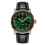 The Breitling Navitimer Automatic GMT 41 features a green gradient dial, rose gold case, black bezel, and black leather strap with gold hands and white accents. It is powered by the precise Breitling 32 calibre movement.