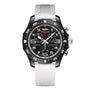 The Breitling Endurance Pro 38 athleisure watch features a black dial with white markers, sports chronograph functions, a rotating bezel, durable Breitlight case, and a white textured rubber strap.