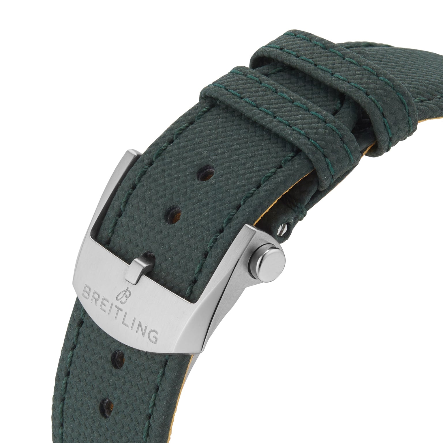Close-up of a green textured strap on the Breitling Avenger Automatic GMT 44 Night Mission, featuring a silver buckle engraved with the Breitling logo and highlighting its rugged aviation-inspired design.