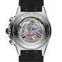Close-up of the Breitling Chronomat B01 42 NFL Miami Dolphins Edition, showcasing its watch back with visible mechanics and a central NFL logo.