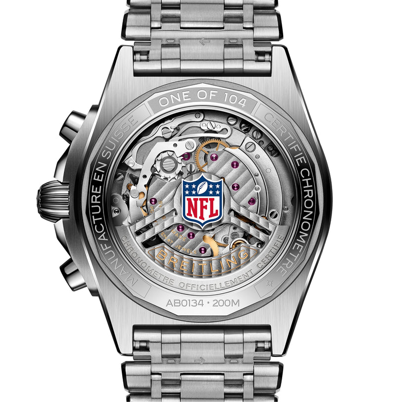 Close-up of the Breitling Chronomat B01 42 NFL Jacksonville Jaguars Edition, highlighting inner gears and the NFL logo on its transparent case back.