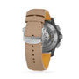 Tan leather watch strap with a silver Breitling buckle, shown from the back on the Avenger B01 Chronograph 42 Night Mission, revealing its visible watch mechanism.
