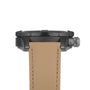 Side view of the Breitling Avenger B01 Chronograph 42 Night Mission, featuring a black case, beige textured strap, and a prominent crown on the right.