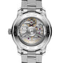 Back view of the Breitling Top Time B31 wristwatch showcases retro aesthetics and an exposed Manufacture B31 movement through a transparent case back, with detailed engravings around the edge.