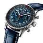 Stainless steel chronograph watch with dark blue dial, tachymeter bezel, red hands, and blue leather strap.