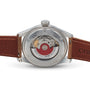 Back view of the Oris Big Crown Pointer Date wristwatch showcasing its exposed automatic movement through a transparent sapphire caseback, paired with a brown leather strap.