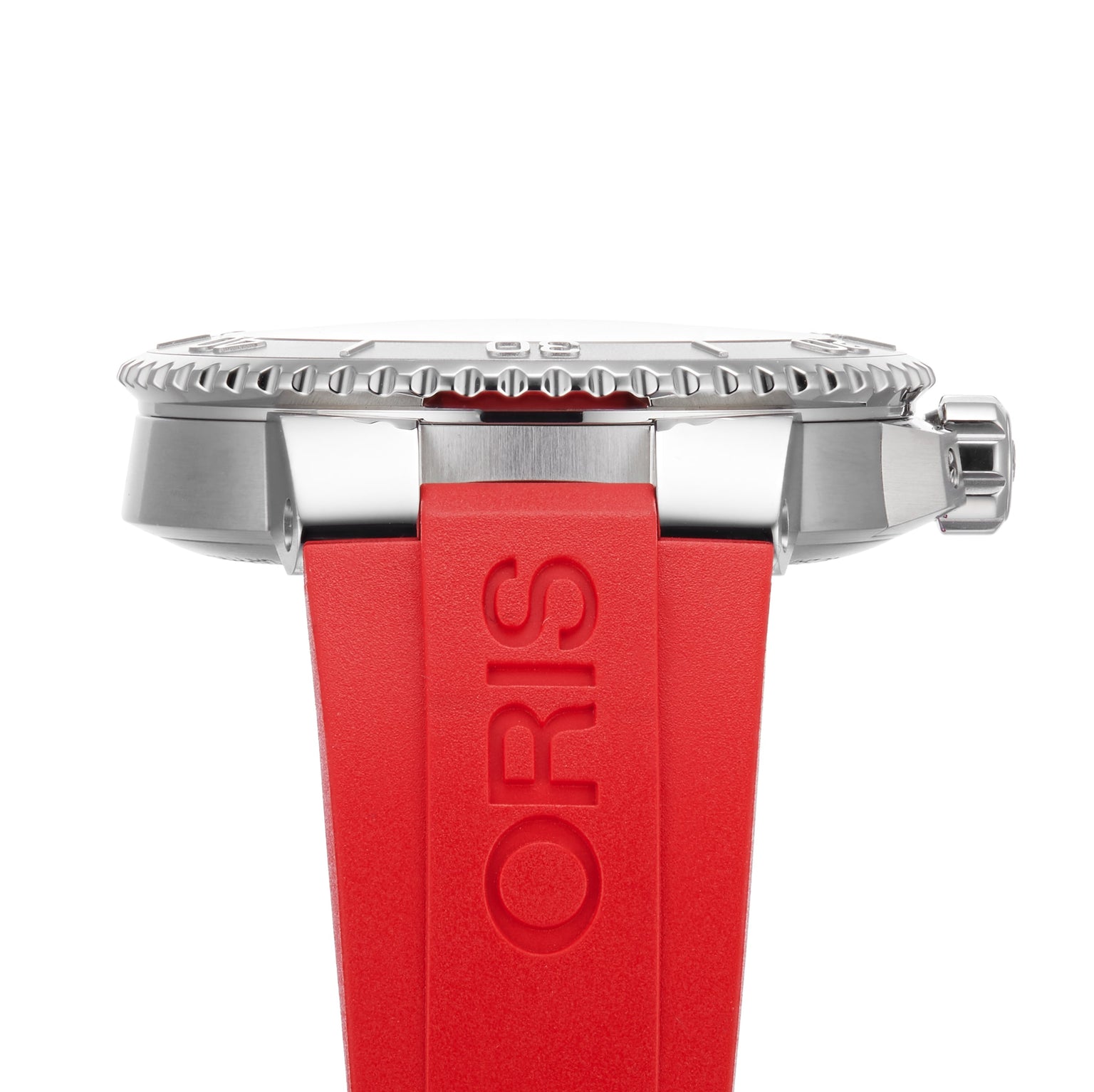 Side view of the Oris Aquis Date Relief watch, featuring a red rubber strap with Oris branding and a ridged bezel, displayed against a white background.