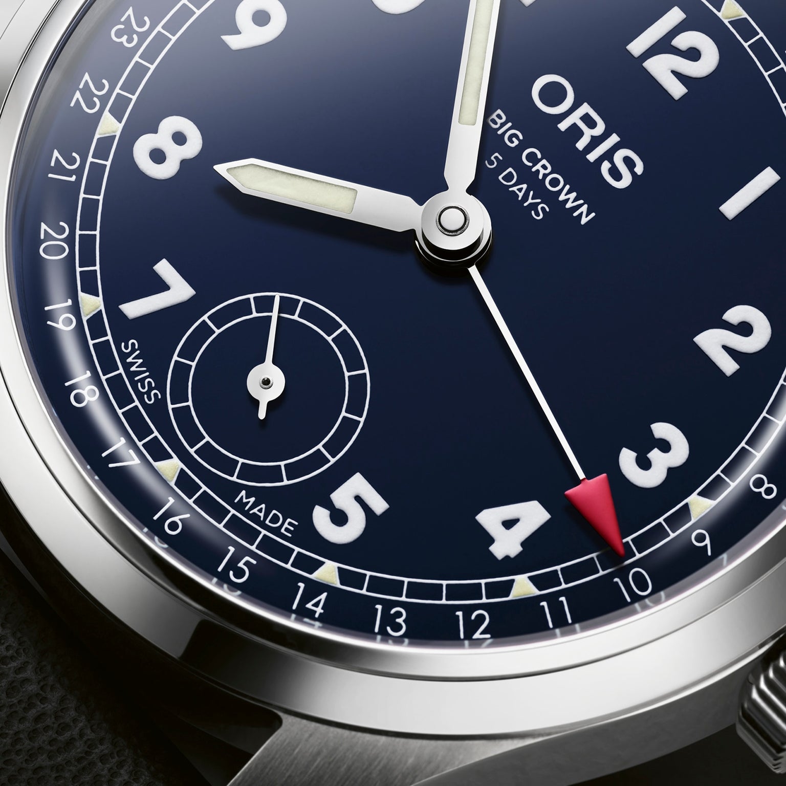 Close-up of the Oris Big Crown Pointer Date Calibre 403 with a blue dial, luminous hands, Arabic numerals, date ring, and a red-tipped pointer indicating 10.