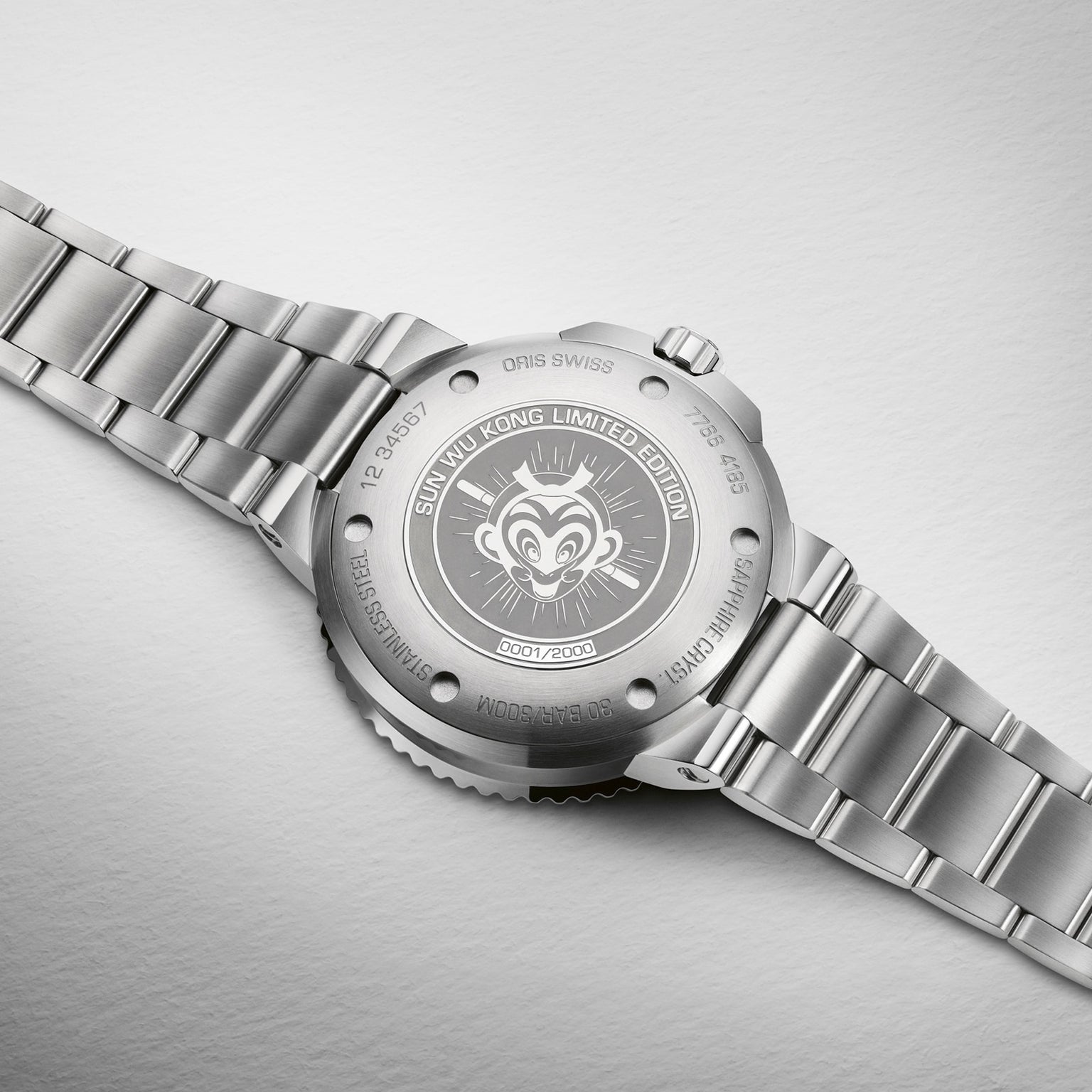 Back view of the Oris Aquis Sun Wukong Limited Edition wristwatch in stainless steel, engraved with the Monkey King face, Sun Wukong Limited Edition, and edition number 0001/2000.