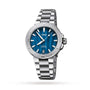 The Oris Aquis Date is a stainless steel divers watch featuring a blue dial, silver markers, date at 6 o’clock, and a metal bracelet, displayed against a white background.