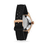 Back view of the Oris Divers Sixty‑Five Date wristwatch featuring a black perforated strap and a rose gold case and buckle, shown on a white background.
