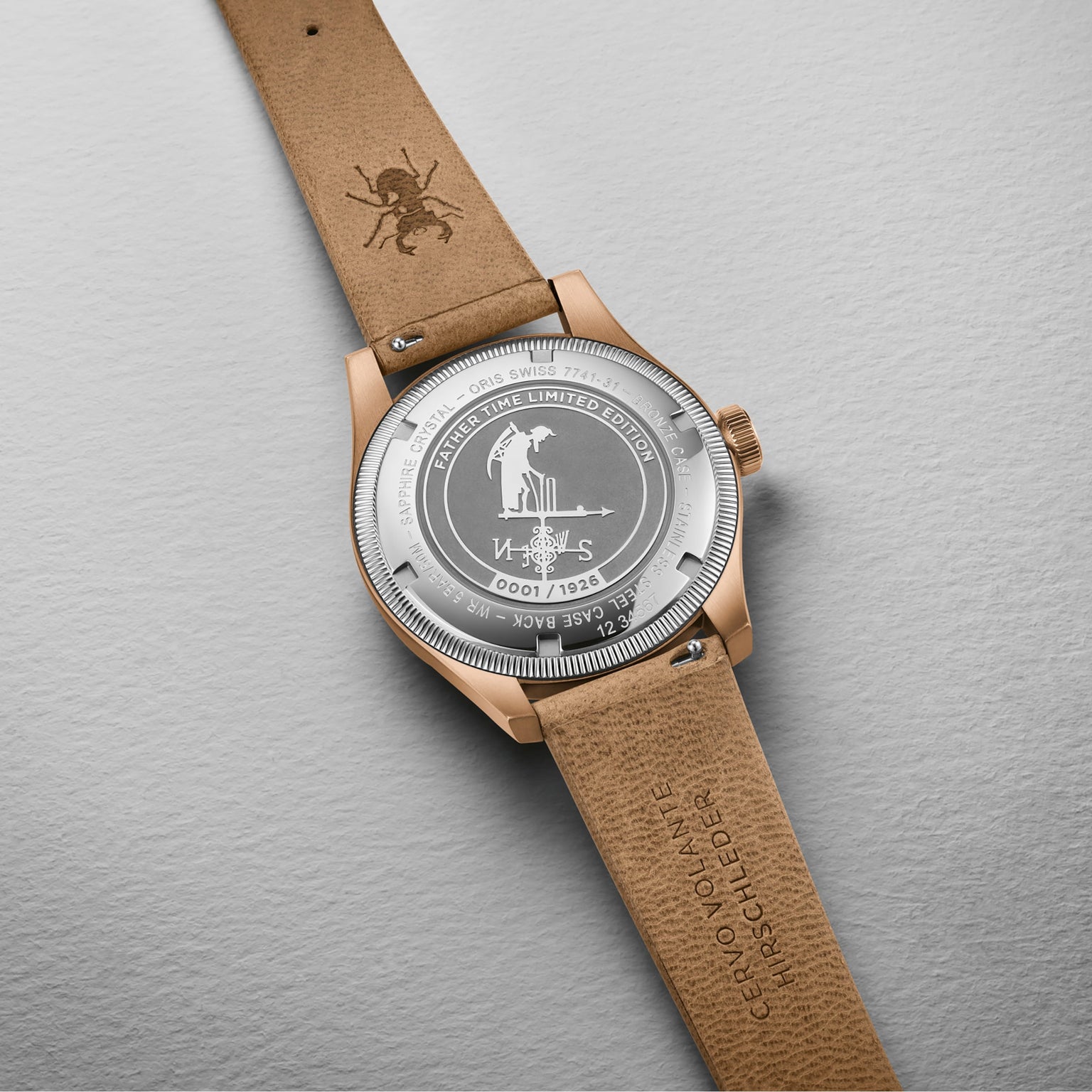 The Oris Big Crown Father Time Limited Edition watch, shown with a brown leather strap, displays an engraved silver back reading SPACE TIME LIMITED EDITION and 001/1969, featuring an astronaut design that celebrates mechanical precision.