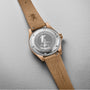 The Oris Big Crown Father Time Limited Edition watch, shown with a brown leather strap, displays an engraved silver back reading SPACE TIME LIMITED EDITION and 001/1969, featuring an astronaut design that celebrates mechanical precision.