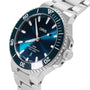 The Oris Aquis Date is a stainless steel wristwatch featuring a blue dial, silver markers, and rotating bezel, shown at 10:10—a stylish mechanical dive watch from Oris.