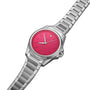 The Oris ProPilot X Miss Piggy Edition is a stainless steel wristwatch with a hot pink dial, silver hour markers, and a date window at 6 o’clock. Its brushed metallic band makes it a must-have for fans of this special edition.
