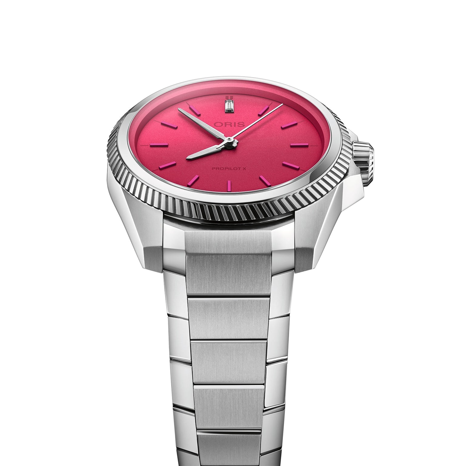 The Oris ProPilot X Miss Piggy Edition wristwatch features a hot pink dial, silver hour markers, and a metal bracelet, shown from an angled perspective.
