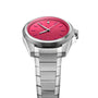 The Oris ProPilot X Miss Piggy Edition wristwatch features a hot pink dial, silver hour markers, and a metal bracelet, shown from an angled perspective.
