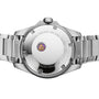 Back view of the Oris ProPilot X Miss Piggy Edition, displaying engraved text around the case and a small cartoon figure at the center of its case back.