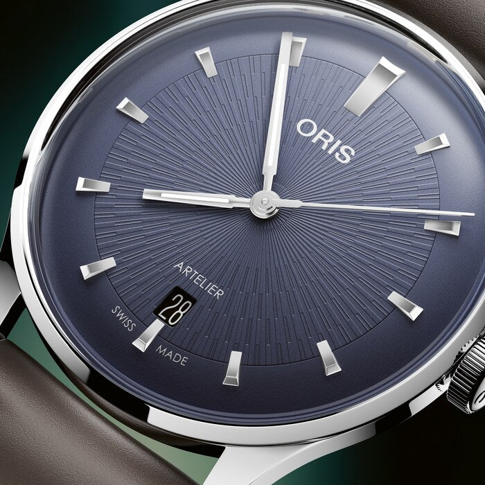 Oris watch with blue dial and brown leather strap