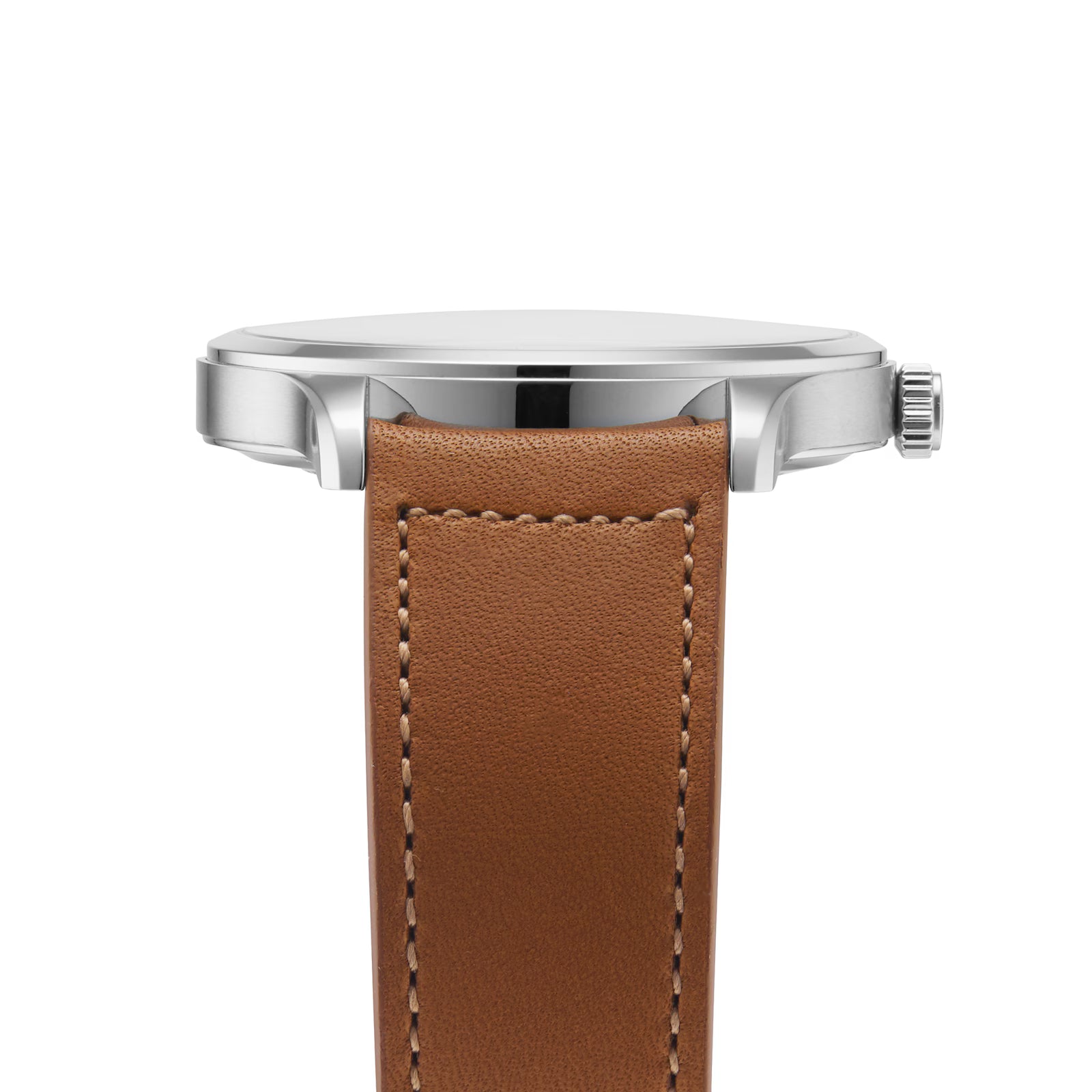 A side view of the Jaeger-LeCoultre Master Control Date shows its stainless steel case, plain crown, and brown leather strap with visible stitching. The watch face is not visible.