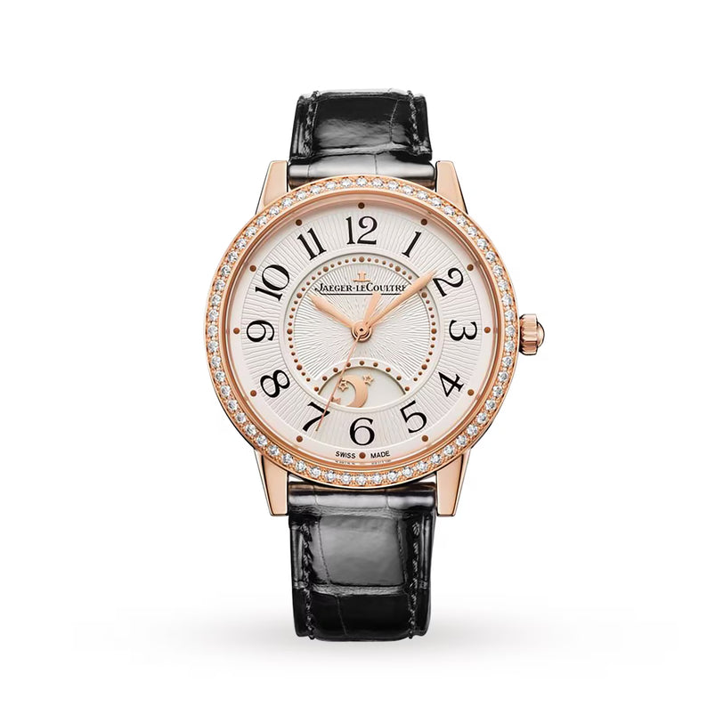 The Jaeger-LeCoultre Rendez-Vous Night & Day is a luxury women’s watch with a black leather strap, pink gold diamond case, and white dial featuring bold numerals, seconds subdial, and the iconic brand name.