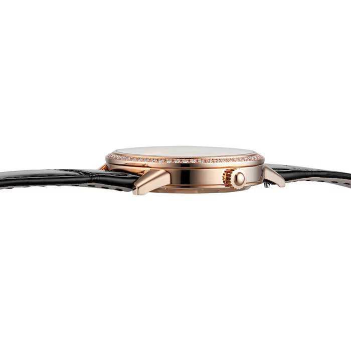 Side view of the Jaeger-LeCoultre Rendez-Vous Night & Day, a luxury women's watch featuring a rose gold case, diamond-set bezel, crown, and black leather strap.