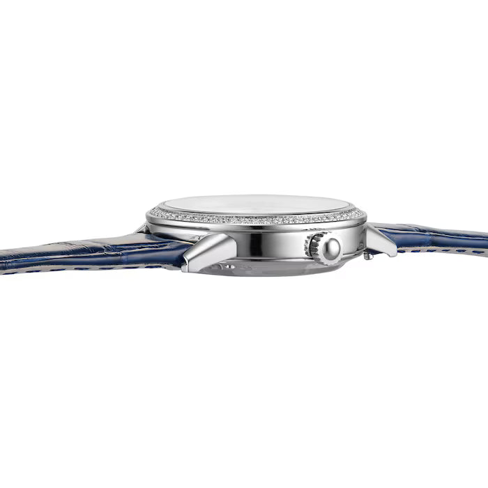 Side view of the Jaeger-LeCoultre Rendez-Vous Night & Day ladies watch with a slim profile, right-side crown, blue leather strap, and diamond-set bezel. This elegant Swiss-made timepiece has its watch face concealed from this angle.