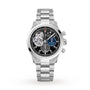 The Zenith Chronomaster Open is a silver wristwatch featuring a black and blue dial, Roman numerals, and an exposed inner mechanism on the left side.