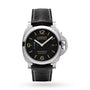 The Panerai Luminor Marina features Italian design, a black dial with tan numerals, a black leather strap, small seconds at 9 o’clock, date at 3 o’clock, and a stainless steel case with crown guard.
